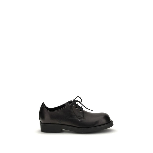 MM6 Maison Margiela 100% Calf Leather Bos Taurus flat in black