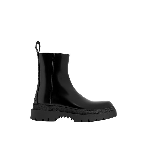 Bottega Veneta 100% calf leather; leather lining and insole; rubber sole boot in black