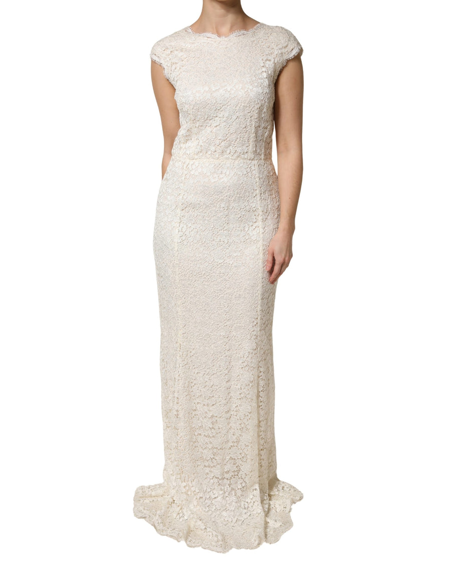 Dolce & Gabbana 75% Viscose 25% Nylon; Lining: 86% Silk 8% Cotton 4% Elastane 2% Nylon dress in white