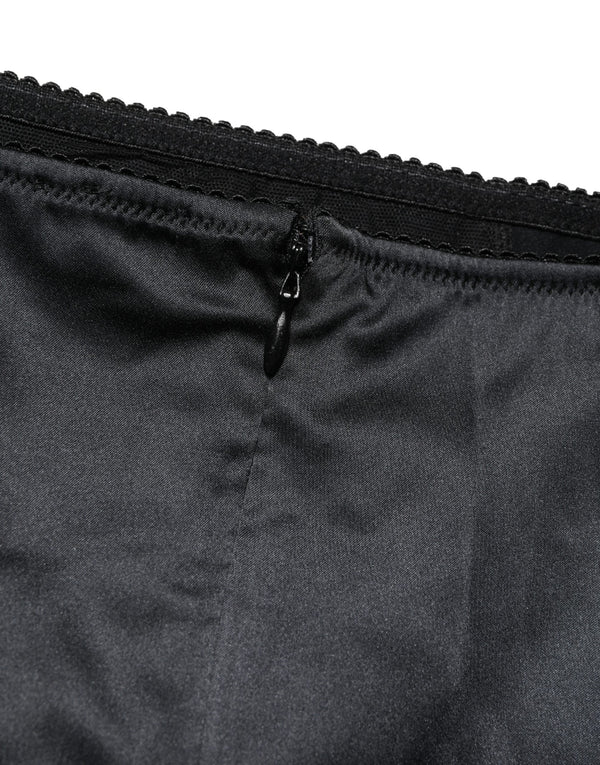 Dolce & Gabbana 94% Silk 6% Elastane; Lining: 90% Nylon 10% Elastane girdle bodysuit in black