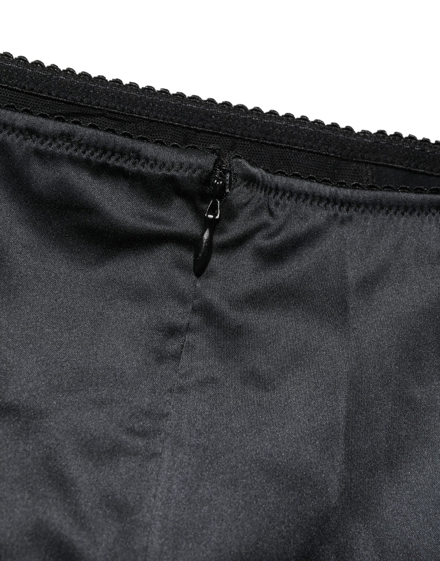 Dolce & Gabbana 94% Silk 6% Elastane; Lining: 90% Nylon 10% Elastane girdle bodysuit in black