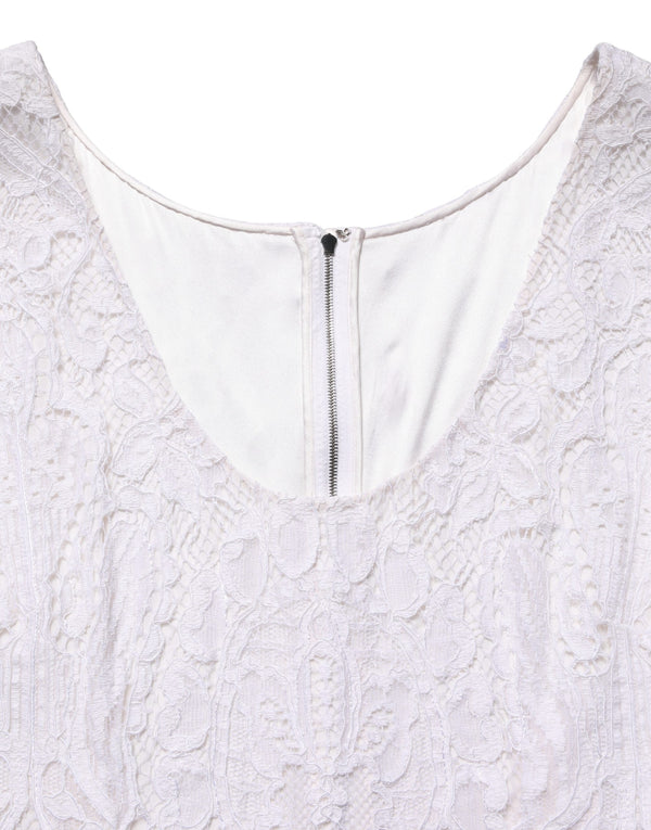 Dolce & Gabbana 75% Viscose 25% Nylon; Lining: 86% Silk 8% Cotton 4% Elastane 2% Nylon dress in white