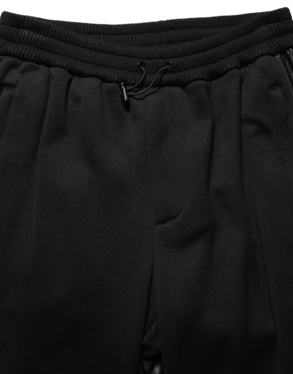 Dolce & Gabbana 56% Polyurethane joggers in black