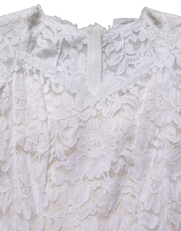 Dolce & Gabbana 52% Cotton 48% Nylon; Lining: 76% Silk 16% Cotton 4% Elastane 4% Nylon dress in white