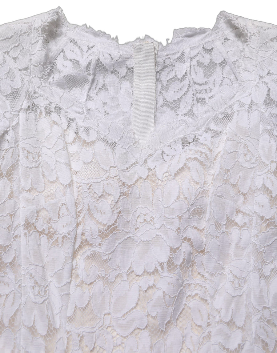 Dolce & Gabbana 52% Cotton 48% Nylon; Lining: 76% Silk 16% Cotton 4% Elastane 4% Nylon dress in white