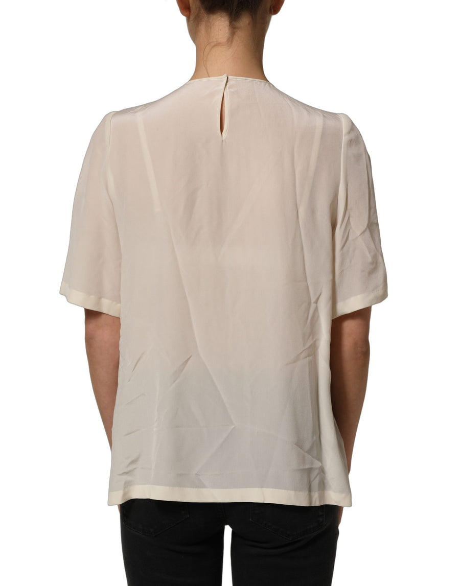 Dolce & Gabbana 73% Silk 14% Cotton 7% Viscose 4% Nylon 2% Polyester blouse in beige