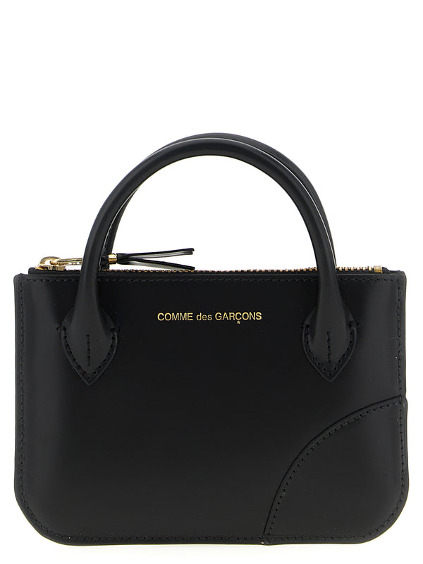 Comme des Garçons 100% cowhide leather card case in black