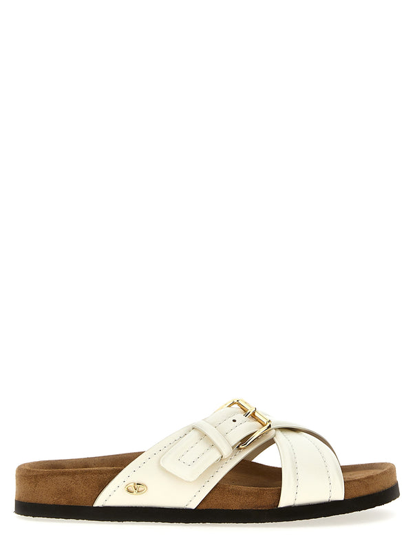 Valentino Garavani 100% calfskin leather with suede insole and rubber sole slide in white