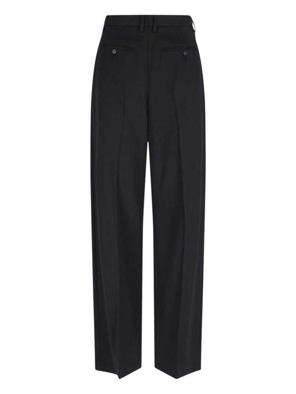MM6 Maison Margiela 54% Polyester trousers in black