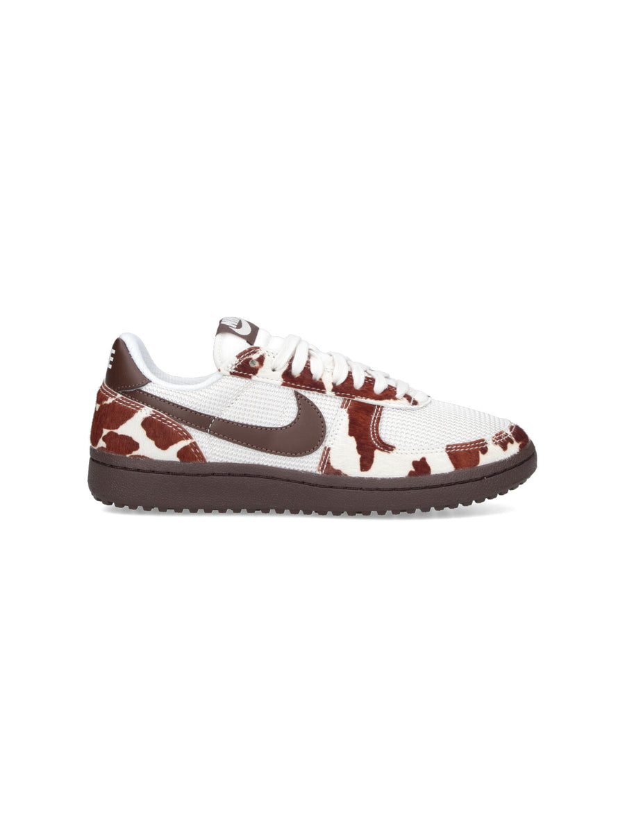 Nike Mesh with leather accents; rubber sole sneaker in white