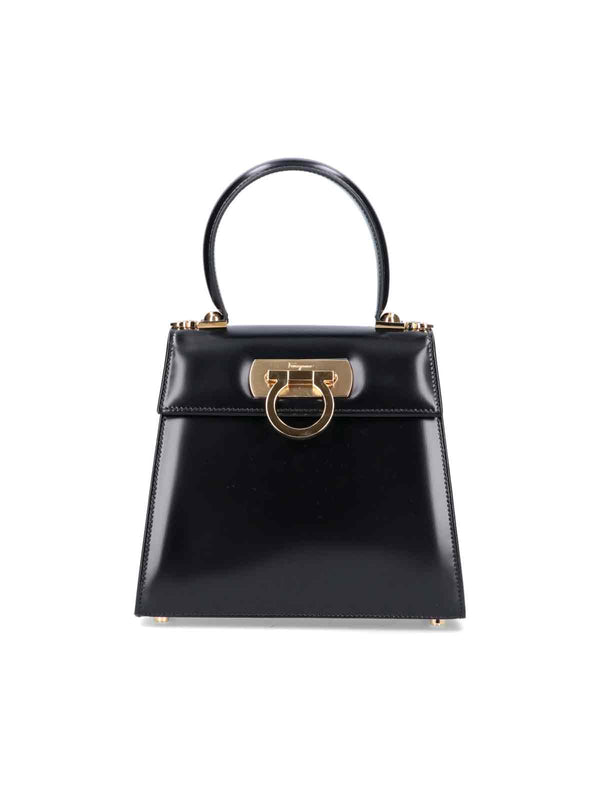 Ferragamo 100% Calf Leather; Lining: 58% Nylon top handle bag in black