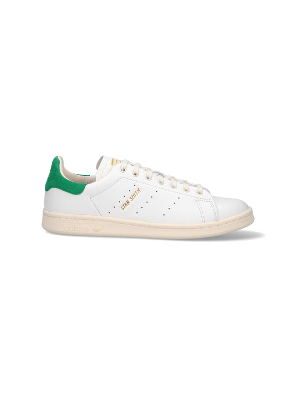 Adidas Upper: leather / suede heel counter sneaker in white