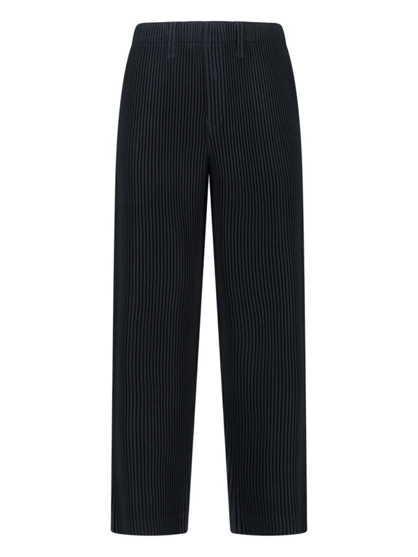 Homme Plisse' Issey Miyake 100% polyester trousers in black