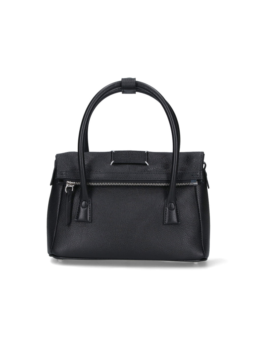 Maison Margiela Goat Leather. Lining: Polyester. Metal Parts: Zama top handle bag in black