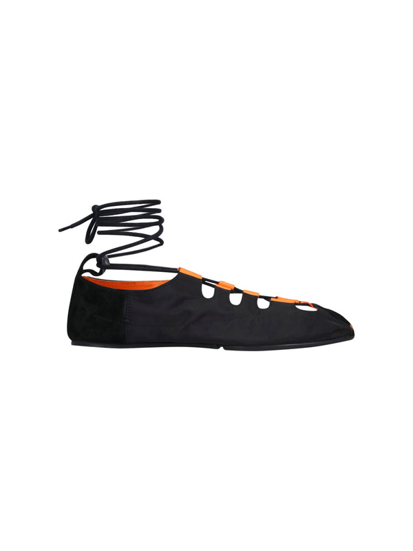 Alaia Suede flat in black