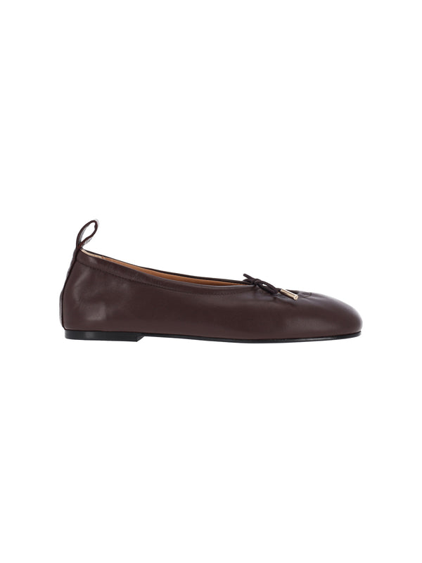 Alohas Upper: 100% Sheep Leather flat in brown
