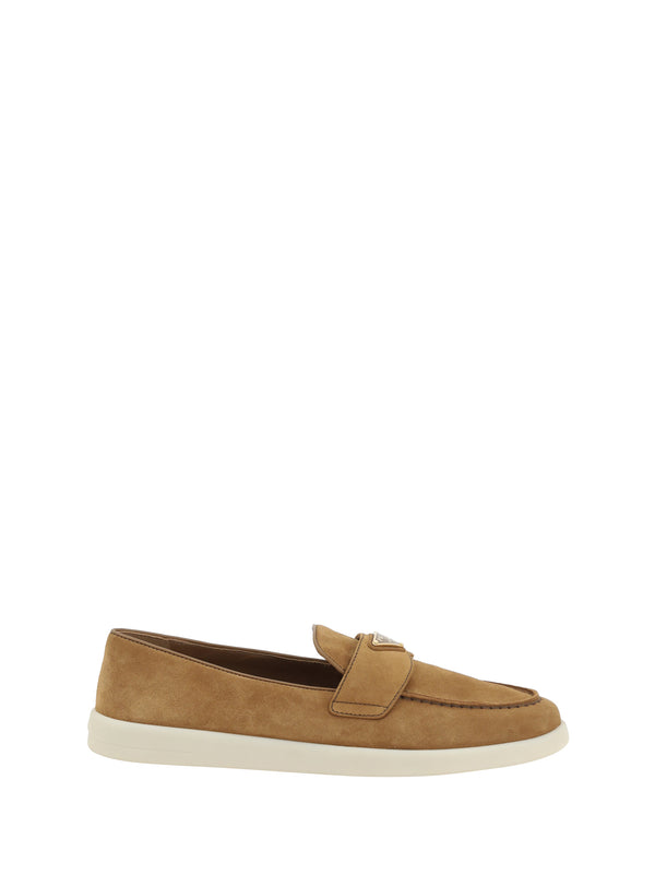 Prada Upper: 100% calf leather; Sole: 100% rubber loafer in beige