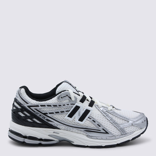 New Balance Mesh and synthetic upper; EVA/rubber sole sneaker in silver