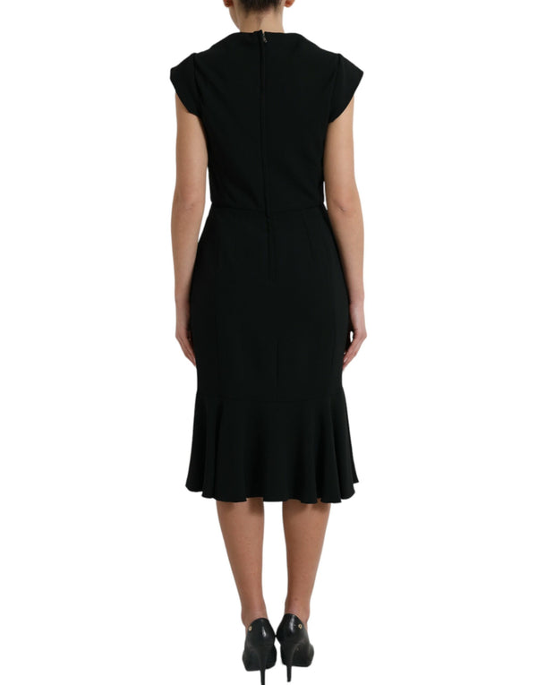 Dolce & Gabbana 51% Viscose 46% Acetate 3% Elastane; Lining: 86% Silk 8% Cotton 4% Elastane 4% Nylon dress in black