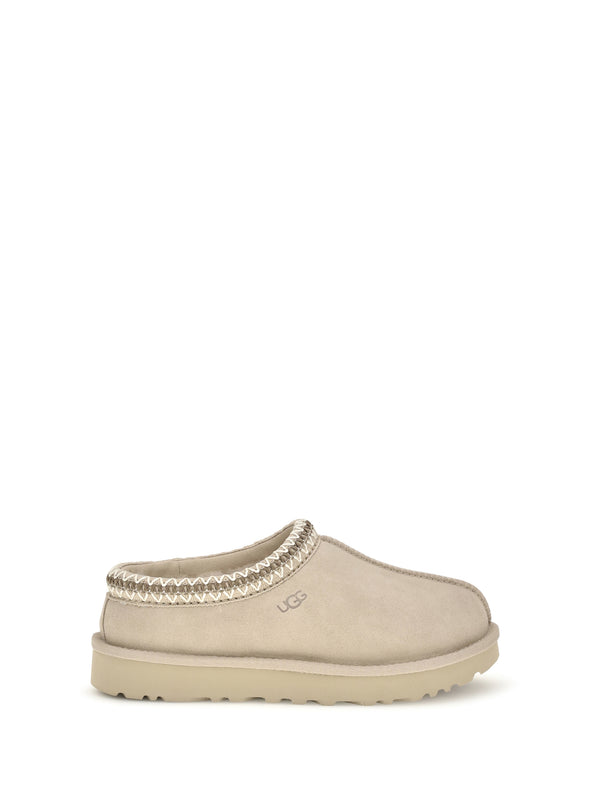 UGG Upper: 100% Mutton; Sole: 100% Rubber mule in beige