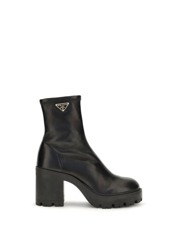 Prada Upper: 100% calf leather; Sole: 100% rubber boot in black