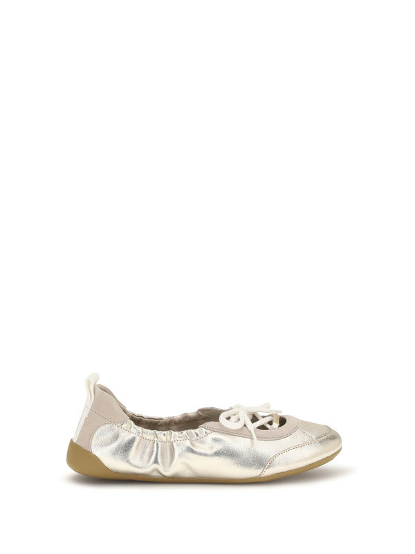 Chloé Upper: 100% calf leather; Sole: 100% rubber sneaker in gold