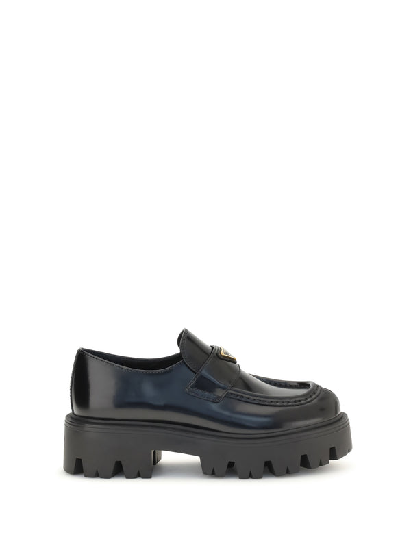 Prada Upper: 100% calf leather; Sole: 100% rubber loafer in black