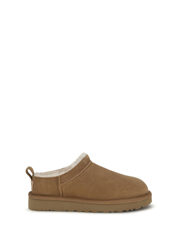 UGG Upper: 100% suede; Sole: 100% rubber slipper in chestnut