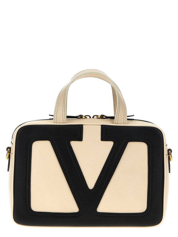 حقيبة مقبض من Valentino Garavani — كรีม لون كریم