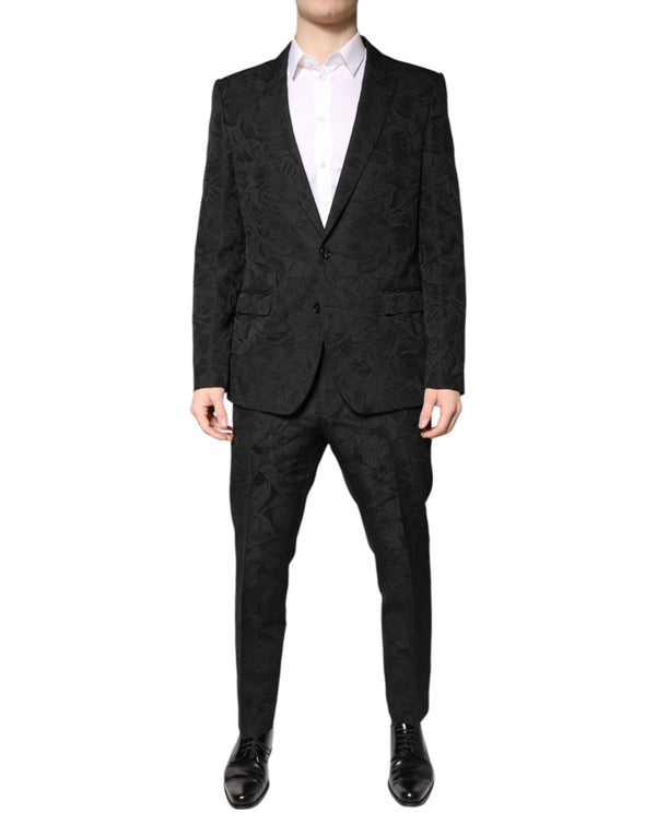 Dolce & Gabbana 40% Polyester 39% Acetate 21% Nylon; Lining: 80% Silk 20% Viscose suit in black