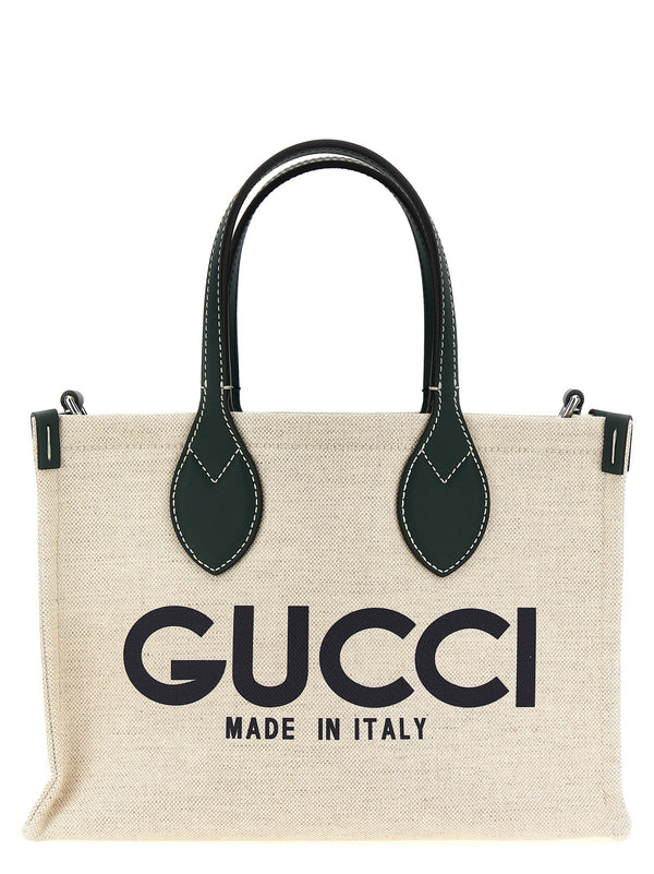 حقيبة تسوق كانفا بنقشة Gucci شعار — بيج