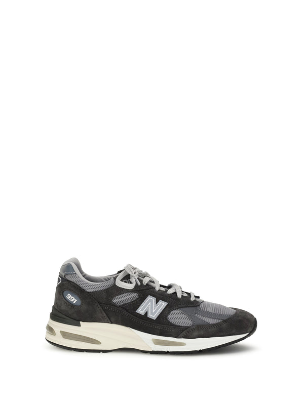 New Balance Upper: Suede and mesh; Sole: Rubber sneaker in black