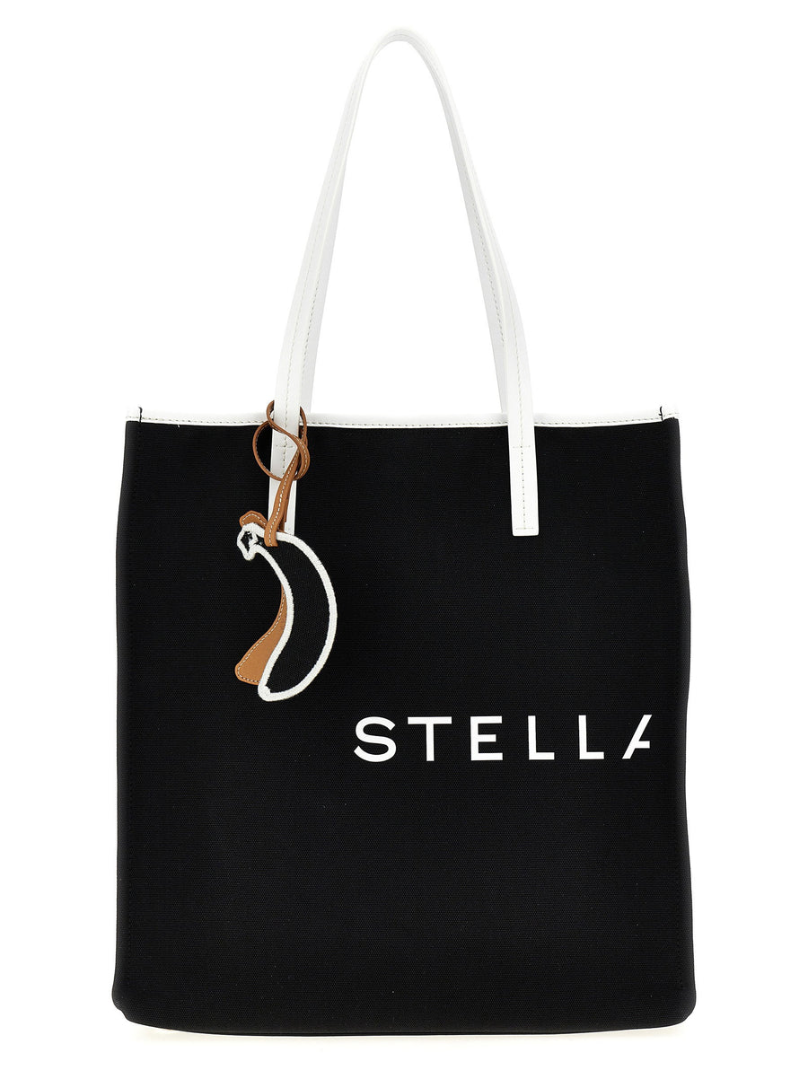 حقيبة تسوق Stella Mccartney مطبوعة بشعار شعار من قماش باناناتيكس® — أسود