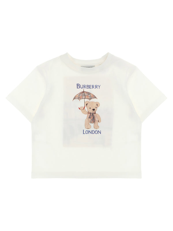 تيشيرت Burberry بتصميم رسوم جرافيكية لتومي بير قميص — لون كريمي