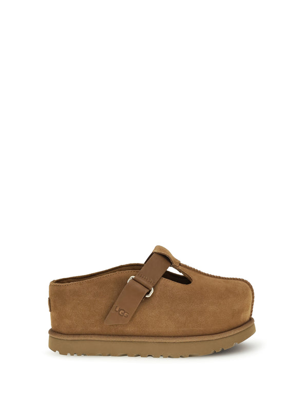UGG Upper: 100% calf leather; Sole: 100% rubber mule in chestnut