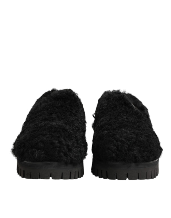 Dolce & Gabbana 83% Lamb + 17% Calf (uppers); 19% Goat + 81% Calf (lining); Leather outsole slippers in black