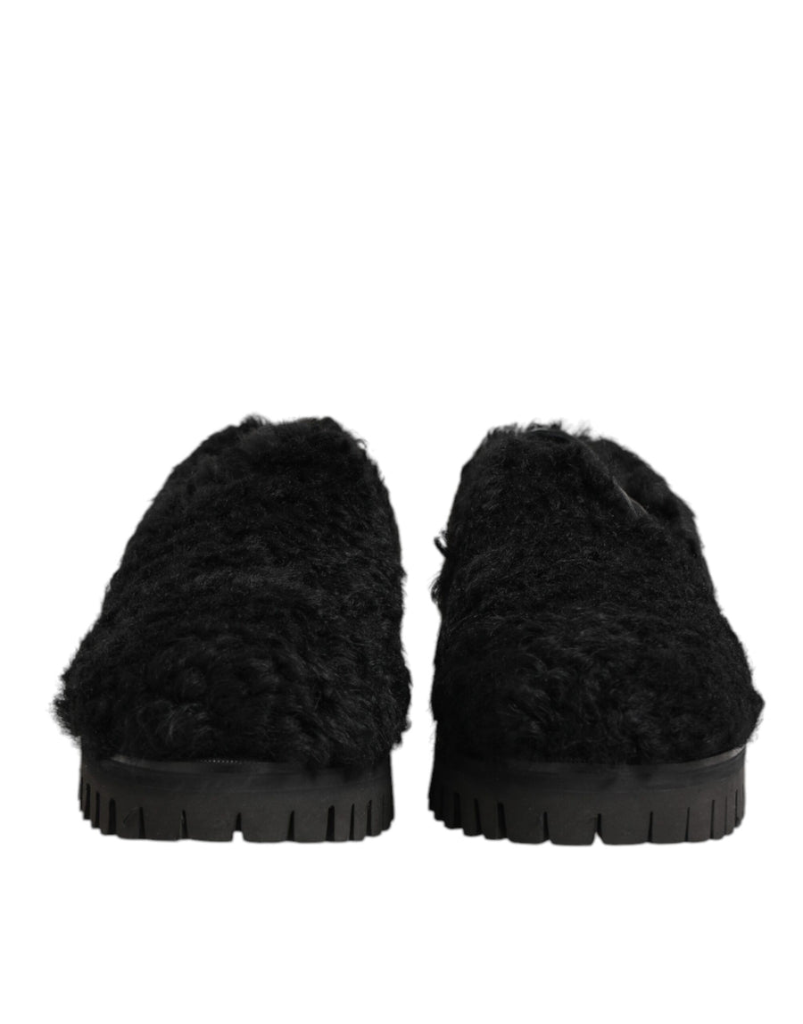 Dolce & Gabbana 83% Lamb + 17% Calf (uppers); 19% Goat + 81% Calf (lining); Leather outsole slippers in black