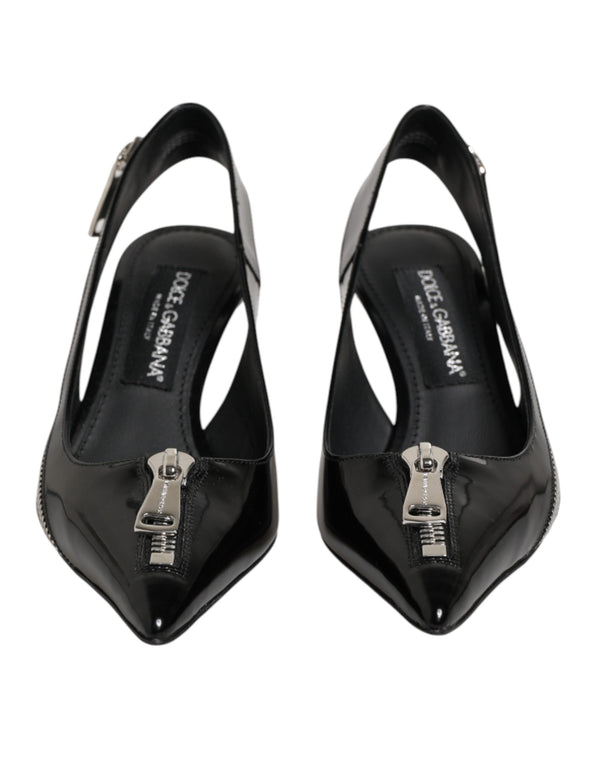 Dolce & Gabbana 100% Calf leather; Interior: 76% Goat + 24% Calf; Leather sole slingback heel in black