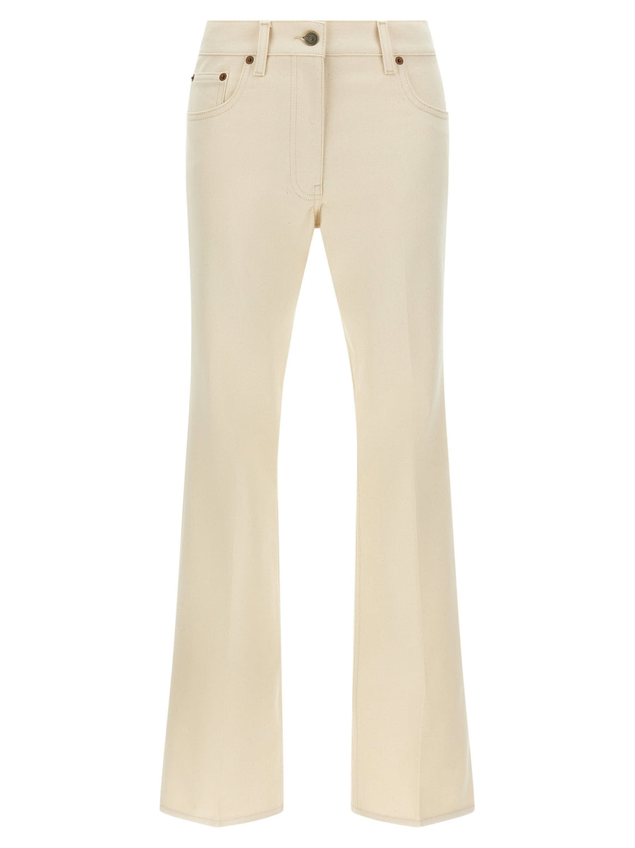 Valentino Garavani Garment-Dyed Flared Jeans — Cream