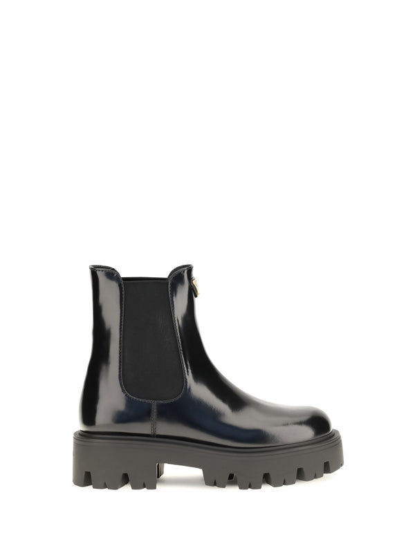 Prada 100% calf leather upper; 100% rubber sole boots in black