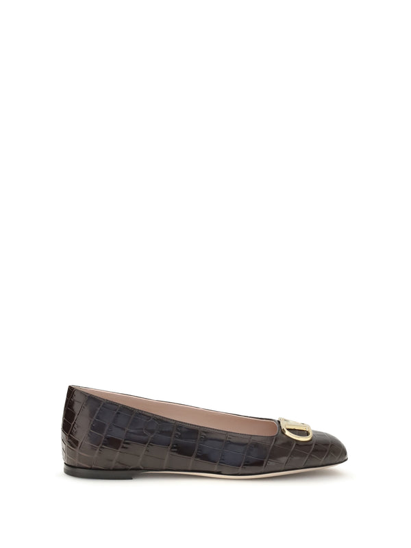 Valentino Garavani Upper: 100% calf leather; Sole: 100% rubber flat in brown