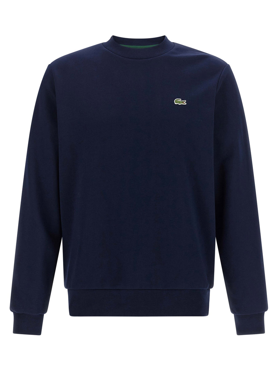 سويت شيرت فليس مطرز بلون كحلي Lacoste شعار