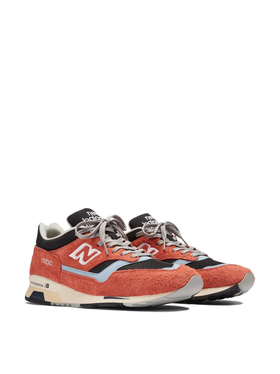 New Balance Suede sneaker in orange