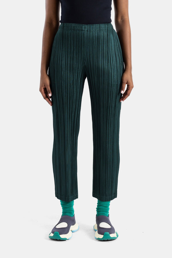 Pleats Please Issey Miyake trousers in green — view 2