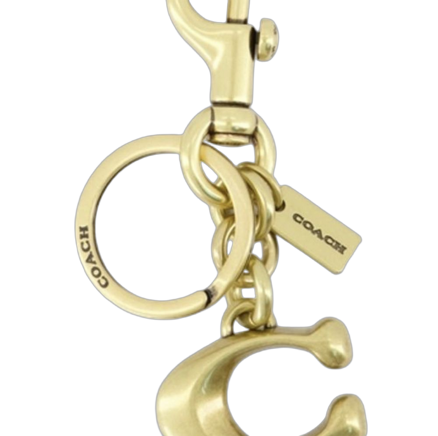 Coach metal charm in gold