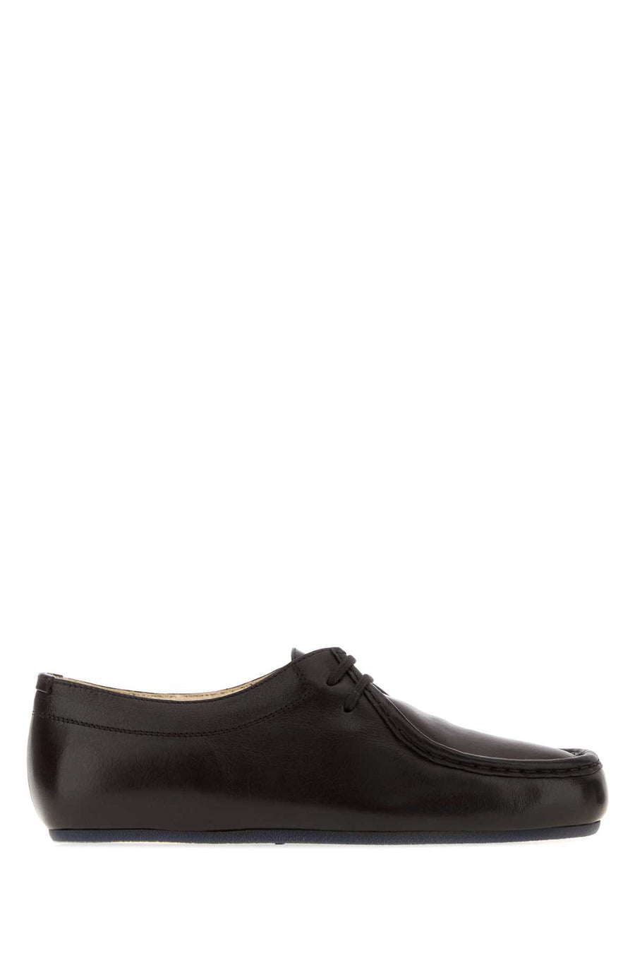 Jil Sander Upper: 100% water buffalo leather; Lining: 100% lamb wool; Contrast: 100% sheep leather; Interior: 100% lamb wool; Sole: 100% rubber loafer in black