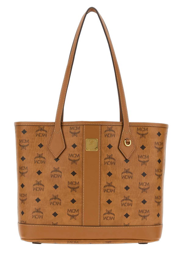 MCM Shopper Exterior: 100% Fabric; Lining: 100% Fabric; Finishing: Golden metal tote bag in cognac