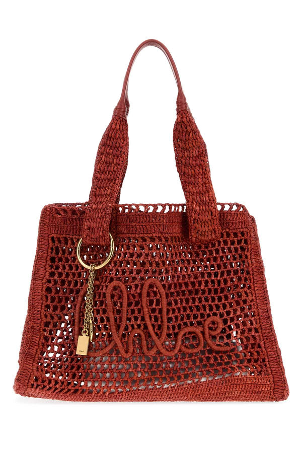 Chloé Summer Exterior: 100% Raffia; Finishing: Golden metal shoulder bag in red