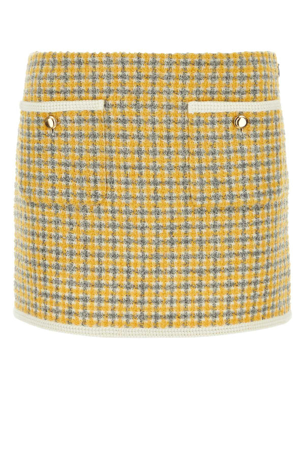 Miu Miu Exterior: 47% Wool 19% Alpaca 19% Mohair 15% Nylon; Lining: 69% Acetate 31% Cupro mini skirt in yellow