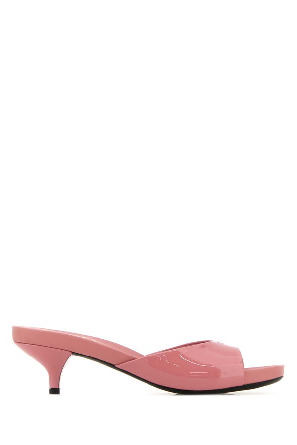 Prada Exterior: 100% Leather; Interior: 100% Leather; Sole: Rubber mule in pink